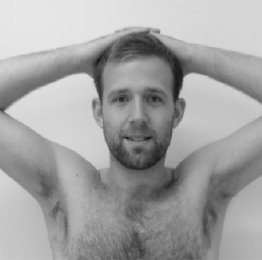 Hands placed on top of the head