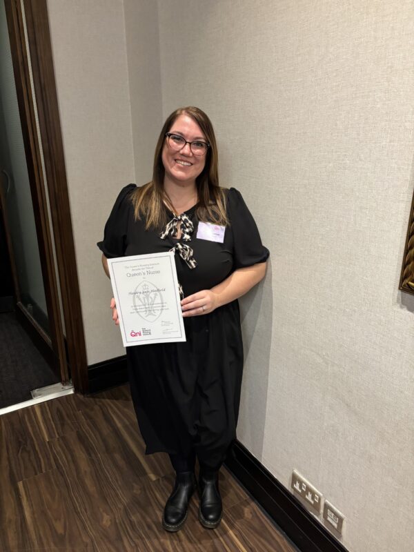 Hayley with the Queen's Nurse title at the award ceremony
