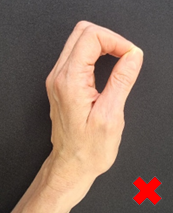 image showing how not to perform a pinch grip with your hand