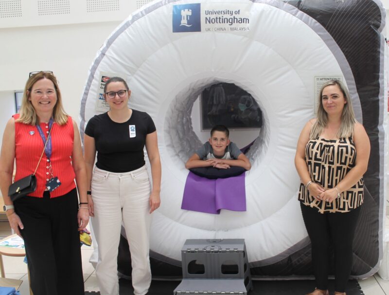 Ollie Smith, 10, with his mum Paulina Smith (R) along with the MRI Fun Day team