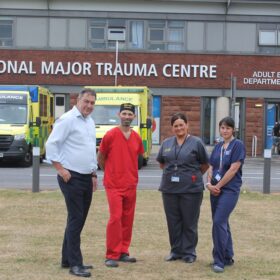 Steve Turner outside James Cook A&E with hospitalstaff