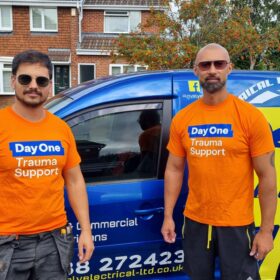 Cory and Mark wearing Day One t-shirts