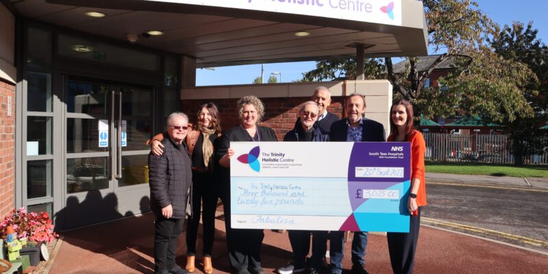 Fabulosa present a cheque to Trinity Holistic Centre