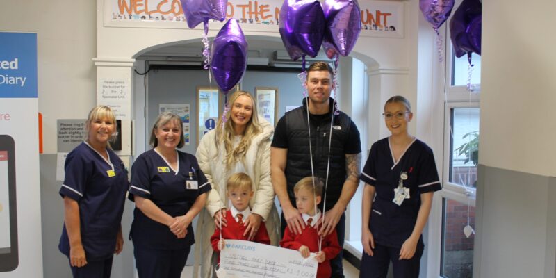 The-Adams-handing-over-the-cheque