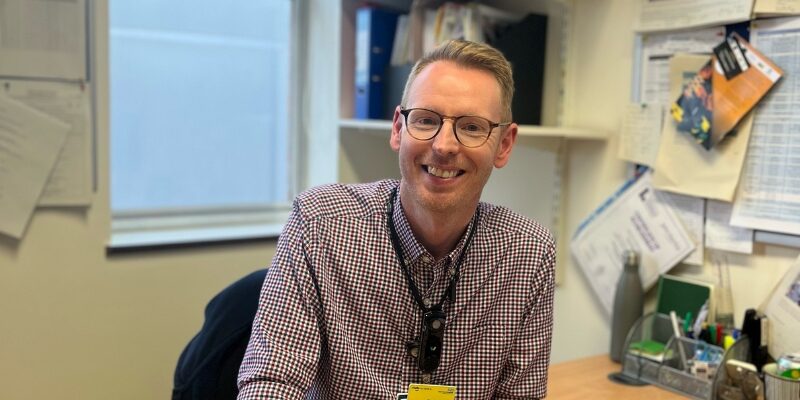Paul Kirby sat at his desk smiling.