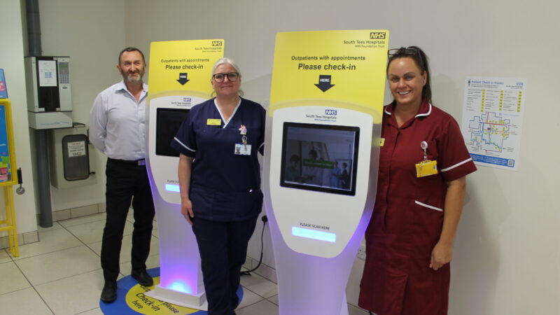 (Left to right) Jay Garrett, digital programme manager, Maxine Stephens ward manager and HCA Lindsey Painter with the self-check-in kiosks