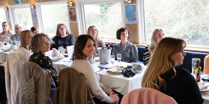 a group of women enjoying a celebration event