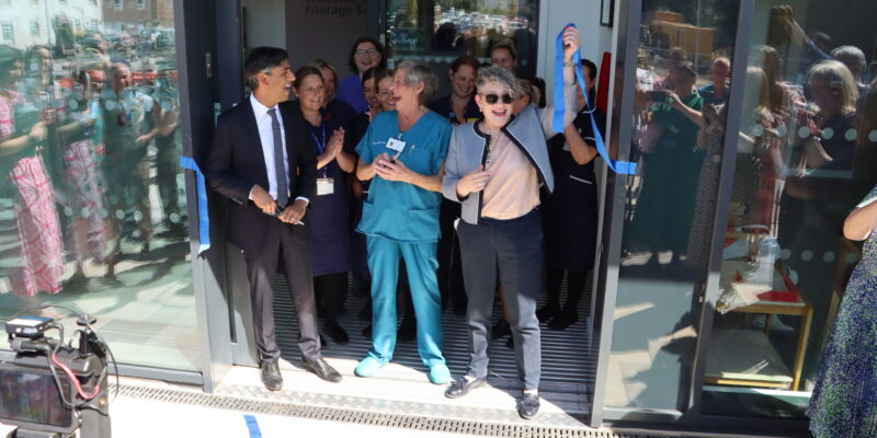 MP Rishi Sunak, 80-year-old scrub nurse Anne Lamb and Public health and prevention minister Ashley Dalton cutting the ribbon for the purpose-built facility