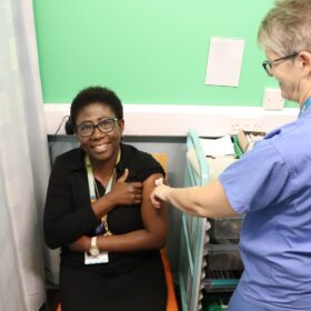 Esther Mireku, public health consultant, having a flu vaccine recently