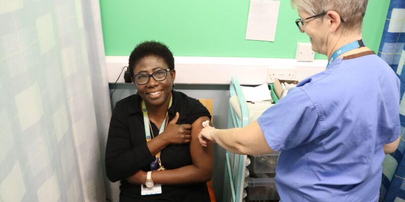 Esther Mireku, public health consultant, having a flu vaccine recently